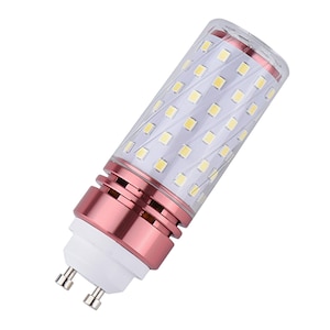Può includere: Lampadina a LED con un design cilindrico trasparente. La lampadina presenta una base color oro rosa e una copertura in plastica trasparente che ospita numerose piccole luci LED quadrate. La luce è progettata per essere efficiente dal punto di vista energetico.