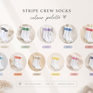 May include: White crew socks with coloured stripes in various colours, including black, green, lilac, blue, red, sky, orange, beige, yellow, pink, and violet. The text "STRIPE CREW SOCKS colour palette" is at the top. The socks are made of a soft cotton blend.