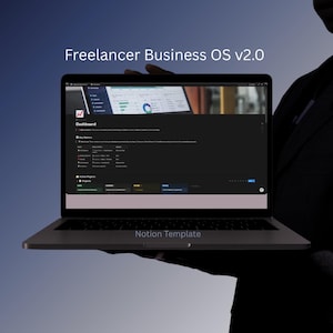 May include: A laptop displaying the Freelancer Business OS v2.0 Notion Template. The screen shows a dark-themed dashboard with key metrics, project tracking, and data charts. The interface includes sections for active projects and business management tools.