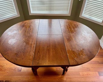 Solid Wood Round Extendable Dining Table – Rustic Brown Finish