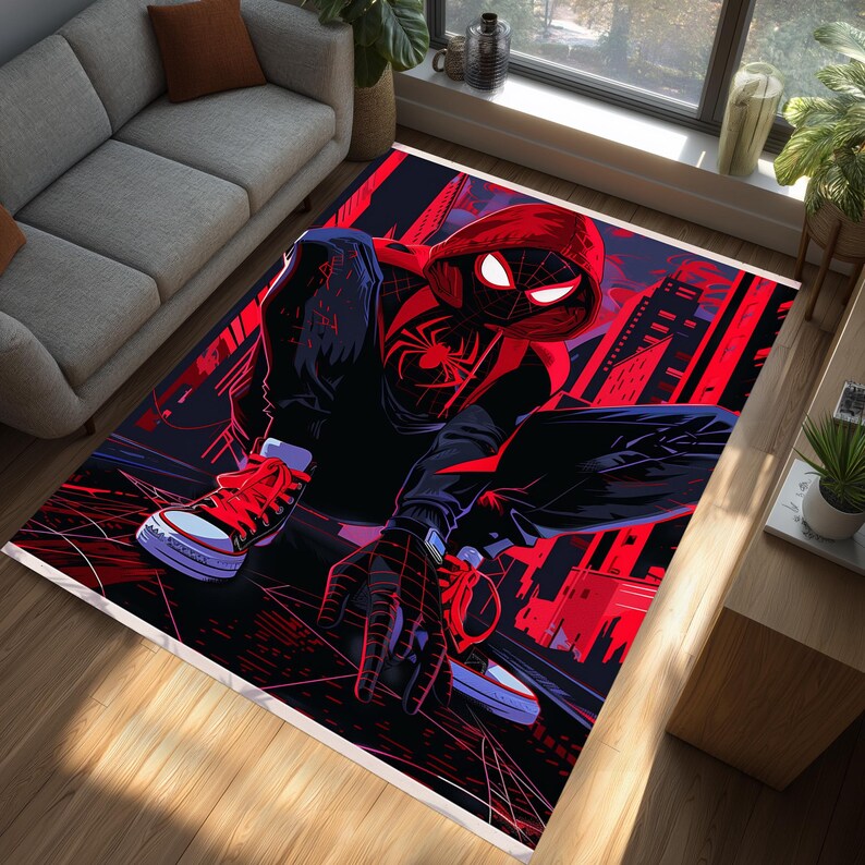 May include: Rectangular area rug featuring a dynamic illustration of a superhero in a red and black suit, set against a cityscape backdrop. The rug has a white border and is placed on a wooden floor.