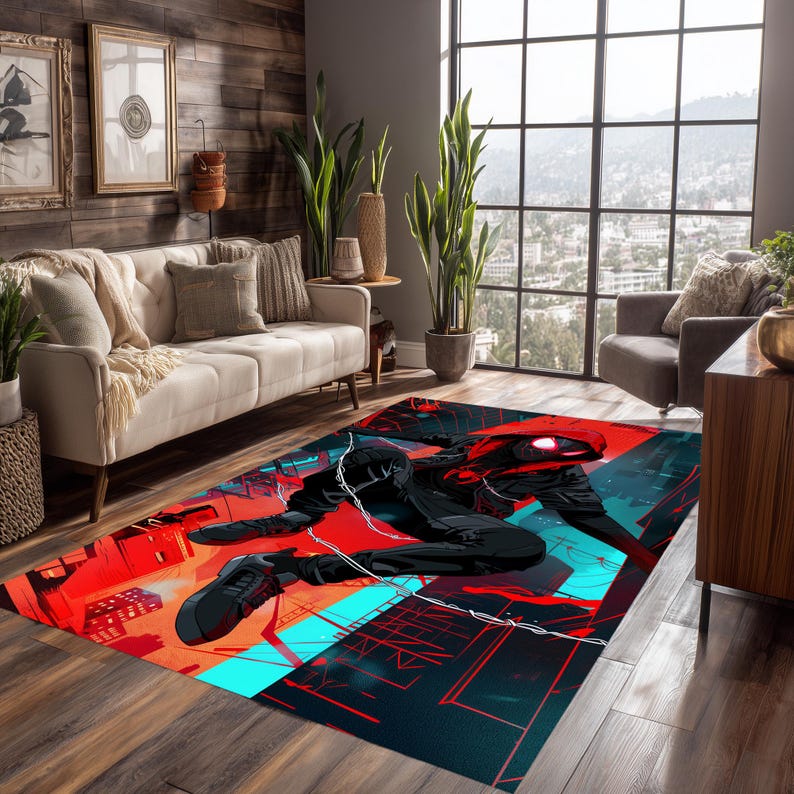 May include: A rectangular area rug featuring a dynamic illustration of a superhero in a red and black suit. The rug has a vibrant color palette of red, black, and teal, with a cityscape design. The rug is placed on a wooden floor.