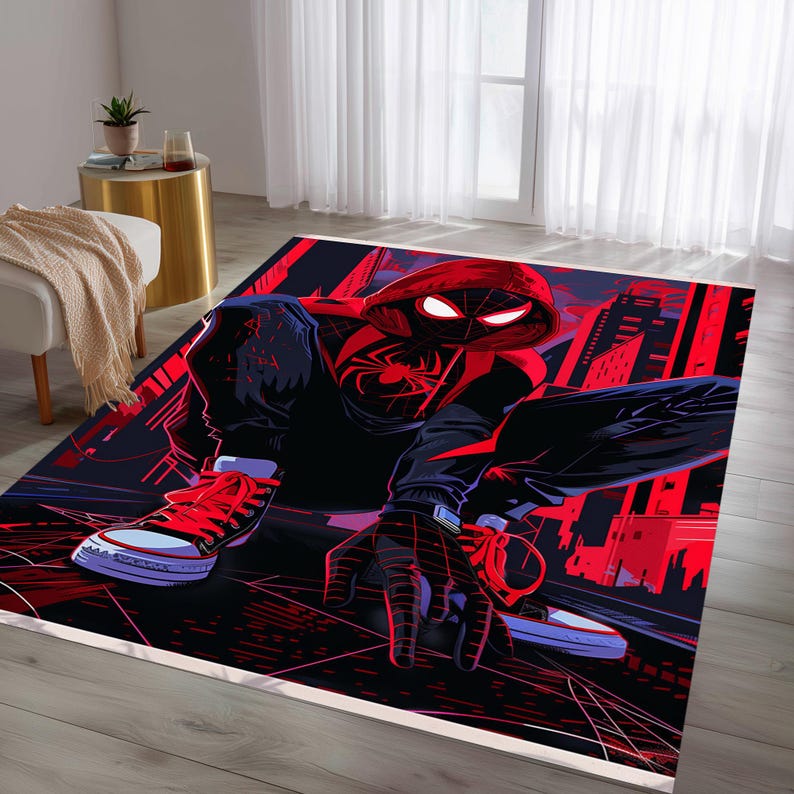 May include: A rectangular rug featuring a dynamic illustration of a superhero in a black and red suit, crouching low. The design includes a cityscape backdrop in red and black, with the superhero's eyes glowing. The rug has a white border.