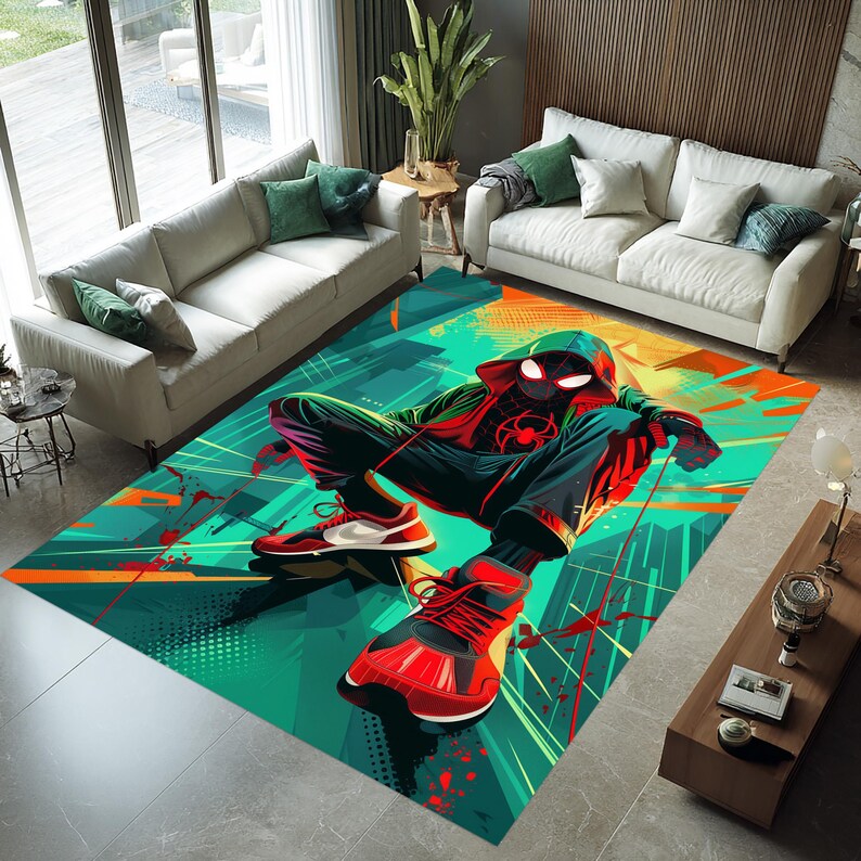 May include: A large rectangular area rug featuring a stylized illustration of a superhero in a dynamic pose. The rug has a vibrant color palette of teal, red, black, and orange. The superhero is wearing a red and black suit with a hood.