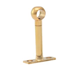 May include: A polished brass curtain rod bracket featuring a vertical cylindrical post attached to a rectangular base plate with two pre-drilled screw holes and a circular ring at the top designed to hold a rod securely in place.