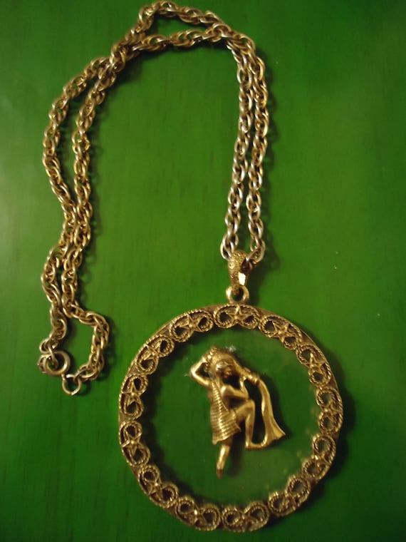 Round Water Boy Gold Ornate Pendant Necklace