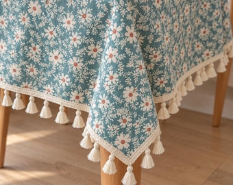 Nappe en lin et coton à motifs floraux turquoise avec franges à pompons