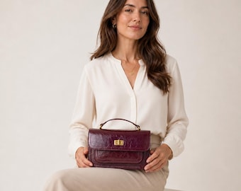 Bolso bandolera mini brillante para mujer, bolso de hombro burdeos y negro, bolso pequeño estructurado con herrajes dorados, bolso elegante para el día a día.