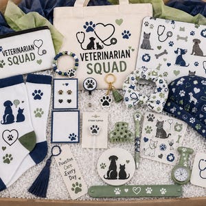 May include: A gift box containing a canvas tote bag, zipper pouch, and scrub cap featuring Veterinarian Squad text and animal motifs. Includes socks, a pen, a hair scrunchie, a hair clip, a bookmark, a keychain, earrings, and a nurse watch.