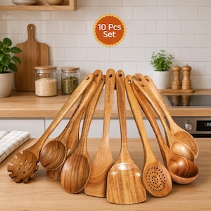 May include: A 10-piece wooden kitchen utensil set. The set includes various spoons, spatulas, and slotted tools. The utensils are made of light brown wood and are arranged in a fan shape. The text "10 Pcs Set" is in a circular orange badge.