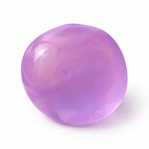 May include: A smooth, rounded, translucent stone in shades of lavender and purple. The stone has a polished appearance and a subtle, internal glow. The shape is organic and irregular, suggesting a natural origin. The stone is set against a white background.