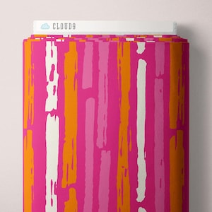 May include: Rolled fabric with a vibrant abstract pattern. The design features vertical brushstrokes in shades of hot pink, orange, light pink, and white. The text "CLOUD9" is visible on the top edge of the fabric.