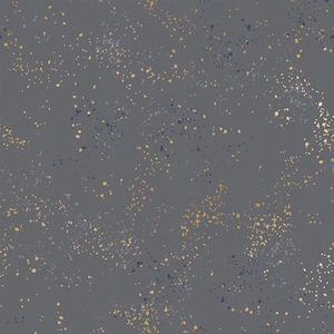 May include: A dark gray fabric featuring a repeating pattern of small, scattered paint splatters in shades of metallic gold, navy blue, and light gray. The design consists of irregular dots and flecks distributed across the entire surface.