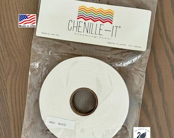 May include: A roll of white Chenille-It blooming bias tape packaged in a clear plastic bag. The label features a colorful chevron design, the text CHENILLE-IT, and states approx. 40 yards 100% cotton. A small white sticker on the roll reads BB01 WHITE.