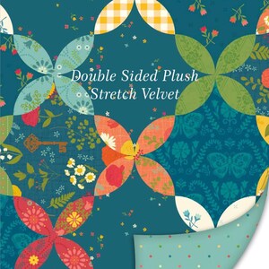 May include: Double Sided Plush Stretch Velvet fabric featuring a teal background with a multi-colored floral and butterfly pattern in a curved grid layout. The bottom corner is folded to reveal a light teal backside with small multi-colored dots.