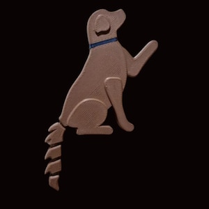May include: A brown dog silhouette with a blue collar, sitting and raising a paw. The dog's tail is stylized with layered segments. The image is set against a solid black background, creating a high-contrast effect.