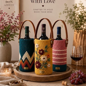May include: Three handmade crochet wine bottle holders in teal, yellow, and pink, each with a leather handle. The teal holder has a geometric pattern, the yellow one has floral embroidery, and the pink one has stripes. The image includes the text "Handmade with Love."