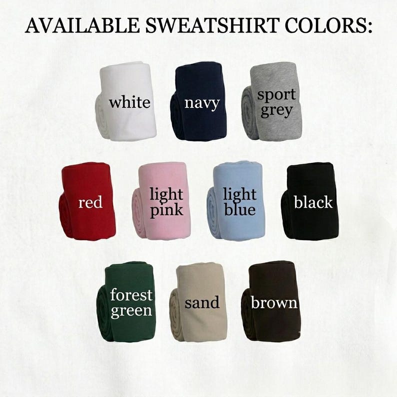 Puede incluir: Imagen que muestra sudaderas enrolladas en varios colores: blanco, azul marino, gris deportivo, rojo, rosa claro, azul claro, negro, verde bosque, arena y marr&oacute;n. El texto en la parte superior dice "AVAILABLE SWEATSHIRT COLORS:"