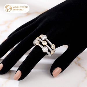 Tweekleurige bubbelring, statement multiband, cocktail zirkonia