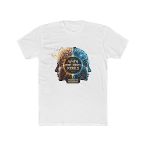 May include: A white t-shirt featuring a graphic of a split human head. The left side shows a biological brain with orange lightning, while the right side displays a blue robotic circuit design. The text reads WHEN INTELLIGENCE REBELS SYNERGETIC AWAKENING.