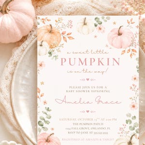 May include: A rectangular baby shower invitation card featuring watercolor illustrations of pumpkins and flowers in shades of pink, orange, and green. The text reads: a sweet little PUMPKIN is on the way! PLEASE JOIN US FOR A BABY SHOWER HONORING Amelia Grace.
