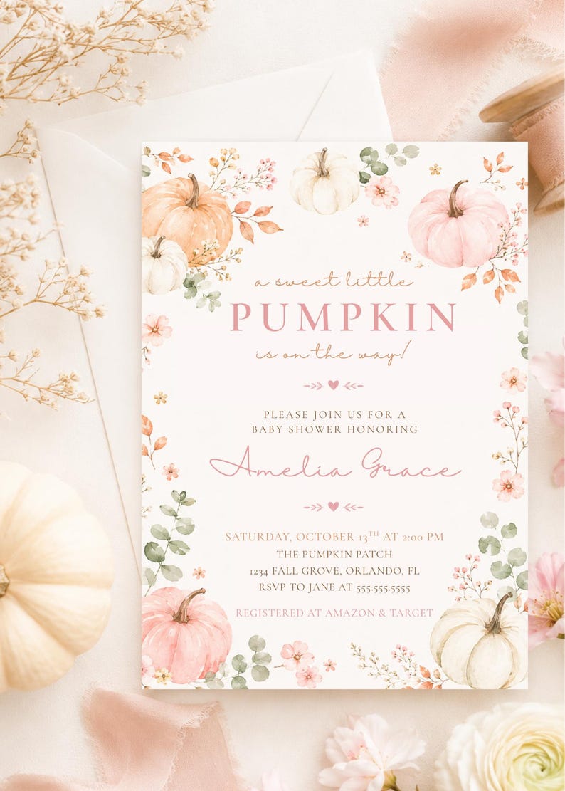 May include: A rectangular baby shower invitation card featuring watercolor illustrations of pumpkins and flowers in shades of orange, pink, and white. The text reads: a sweet little PUMPKIN is on the way! PLEASE JOIN US FOR A BABY SHOWER HONORING Amelia Grace, SATURDAY, OCTOBER 13TH AT 2:00 PM, THE PUMPKIN PATCH, 1234 FALL GROVE, ORLANDO, FL, RSVP TO JANE AT 555-555-5555, REGISTERED AT AMAZON & TARGET.