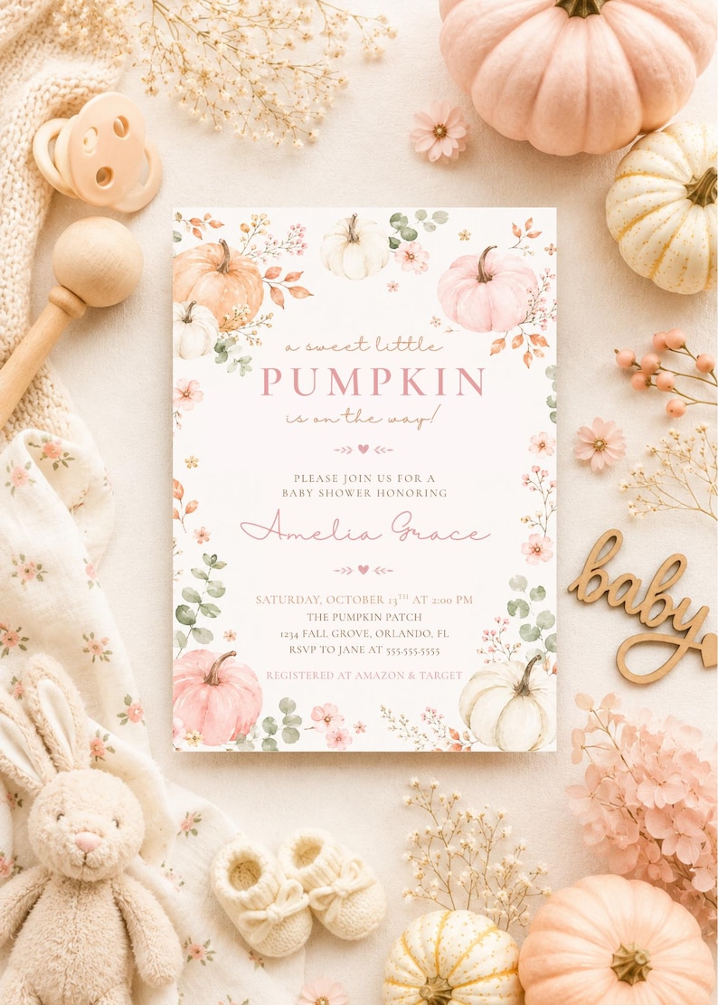 May include: A rectangular baby shower invitation card featuring watercolor illustrations of pumpkins, eucalyptus leaves, and small pink flowers. The text reads: a sweet little PUMPKIN is on the way! PLEASE JOIN US FOR A BABY SHOWER HONORING Amelia Grace.