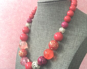 Multi pink beaded necklace with silver textured beads adjustable