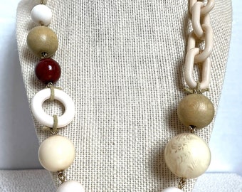Multi bead necklace in ivory tones unusual design with crochet covered bead and suede 24-27 inches long
