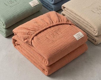 Sábana bajera ajustable de muselina 100% algodón, sábana de gasa económica, ropa de cama suave y transpirable, tamaño King, Queen, Full y Twin, ajuste elástico con bolsillo profundo.