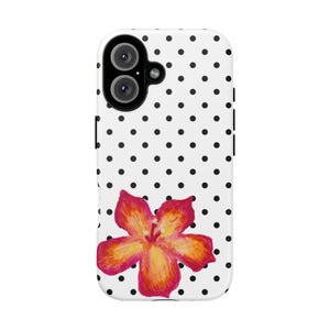 May include: A white phone case with a black polka dot pattern and a watercolor flower design. The flower is a vibrant mix of red, orange, and yellow hues, adding a pop of color to the case.