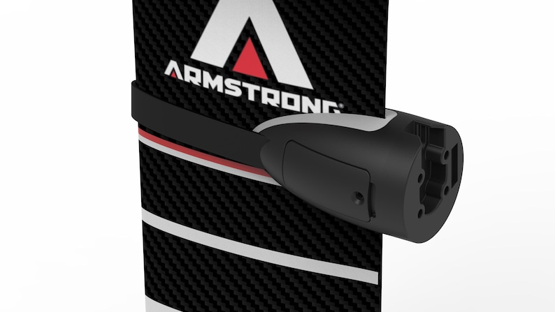 May include: A black and white carbon fiber hydrofoil board with the brand name "ARMSTRONG" in white letters and a red triangle. A black and gray component is attached to the board.