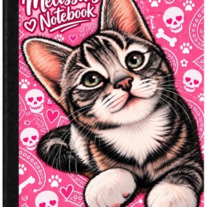 May include: A notebook with a black spine and a bright pink cover featuring a central illustration of a tabby kitten. The background pattern includes white skulls with heart-shaped eyes, bones, and paw prints. The text reads Melissa's Notebook.
