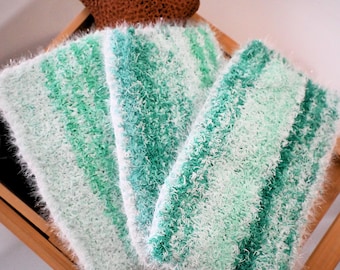 Reusable double sided hand knitted wash cloth.
