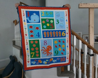 34" x 42" Counting Baby Quilt. 1, 2, 3, 4, 5, 6, 7, 8, 9, 10, Ocean Baby Quilt. whale, fish, octopus, shells, seahorse, blue and red, baby