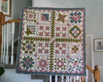 61" X 61" Quilt - Moroccan Tile Look. Bliss BOM with samples of different quilt blocks. green, blue, red, brown, yellow, tan. Throw Size.