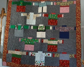 58" X 60" Ugly Sweater Quilt. Favorite Sweater Quilt. Whatever you call it, it will make you giggle just a little. 2 of 3