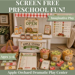 May include: A wooden apple stand toy set featuring a white counter with a red and white checkered awning, apple-themed signs, jars of apple products, baskets of apples, a printed order form, play money, and small wooden crates for imaginative play.
