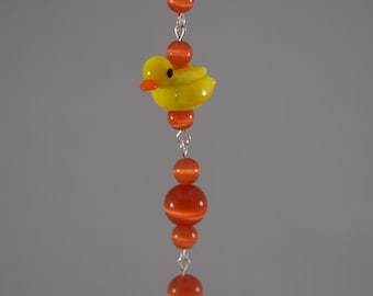 Orange Cat Eye Duck Charm