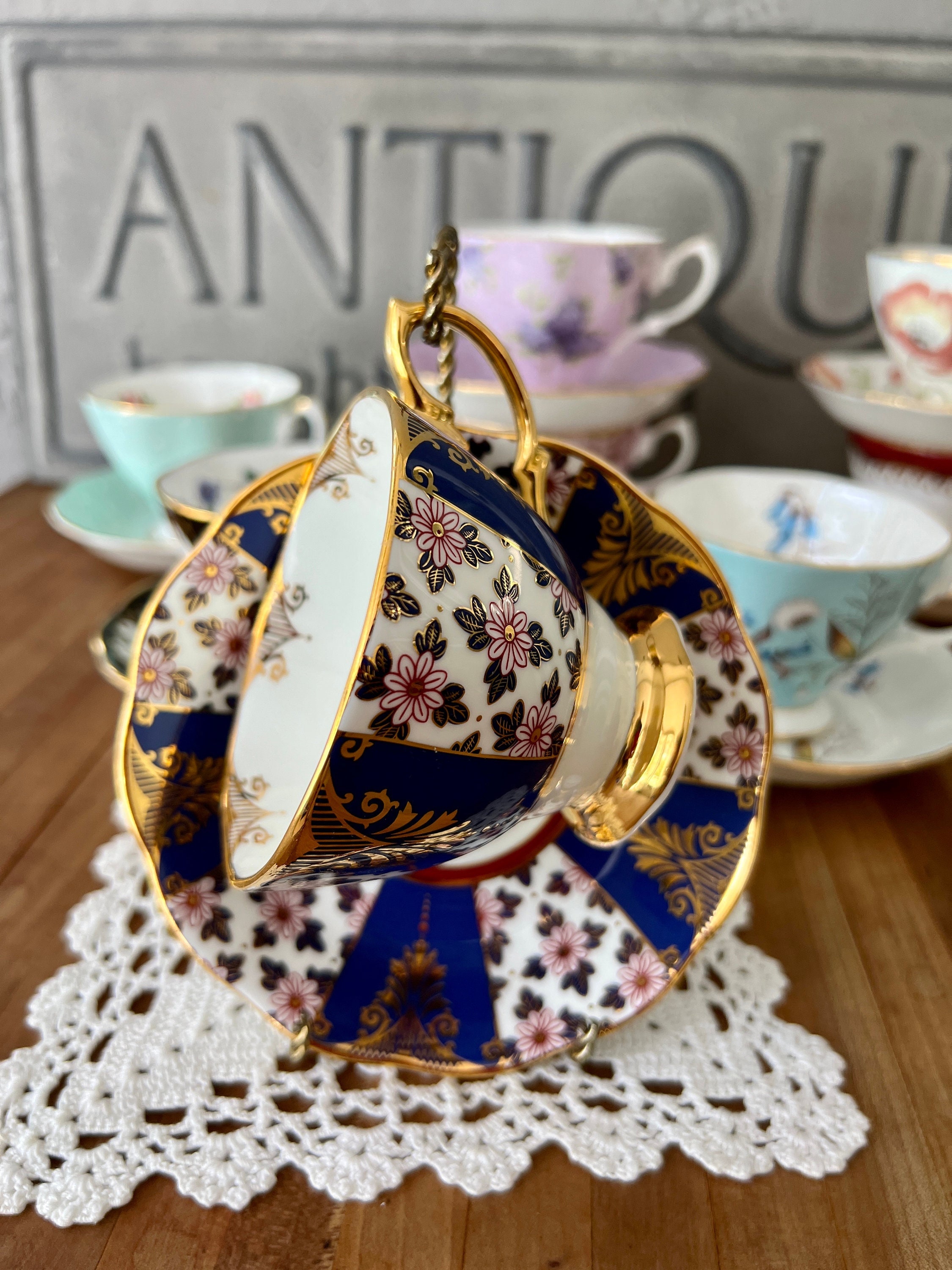 Royal Albert 100 Year Collection Teacup and Saucer with 22K Royal Albert 100 Year Collection Teacup and Saucer with 22K