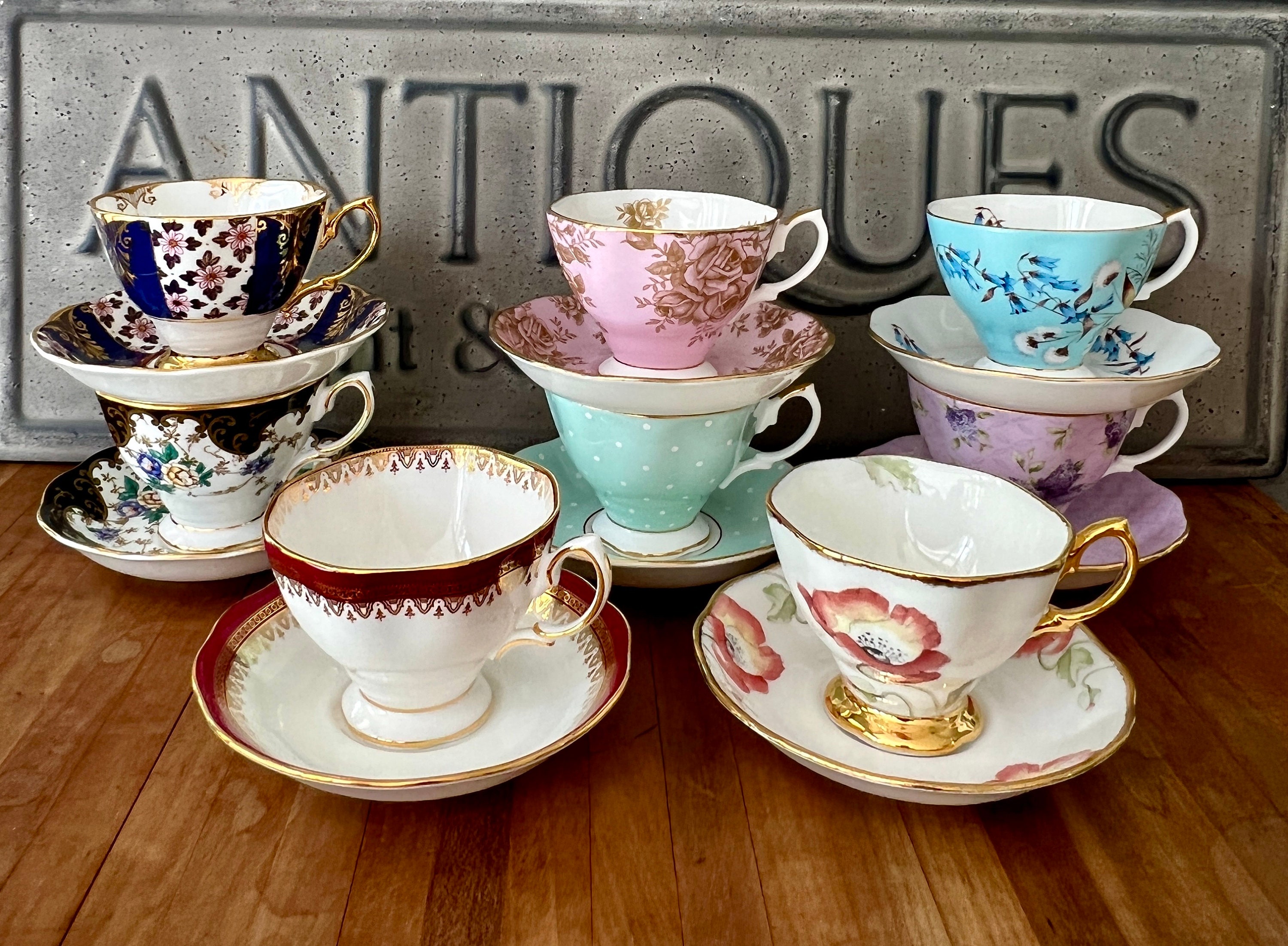 Royal Albert 100 Year Collection Teacup and Saucer with 22K Royal Albert 100 Year Collection Teacup and Saucer with 22K