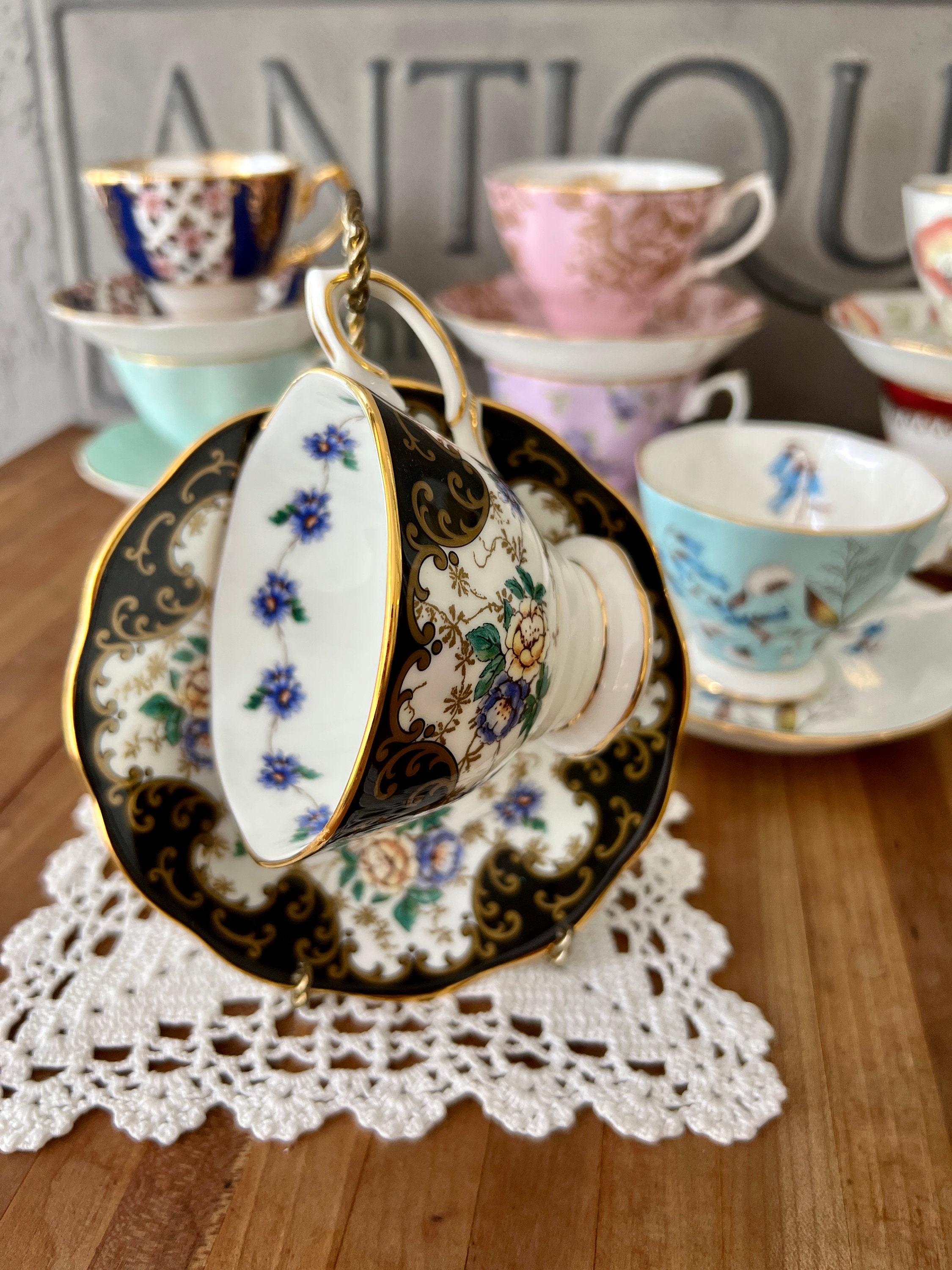 Royal Albert 100 Year Collection Teacup and Saucer with 22K Royal Albert 100 Year Collection Teacup and Saucer with 22K