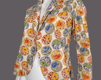 Chaqueta de los años 30 con estampado en naranja, azul, verde y amarillo.