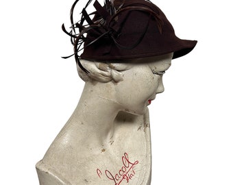 1930s peaked cloche hat or helmet