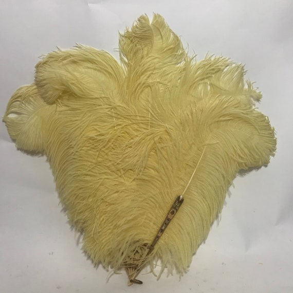 1920s 1930s ostrich feather fan with yellow feathe
