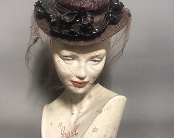 Veiled 1940s tilt hat