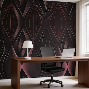 May include: A modern office space featuring a dark brown desk, a black office chair, and a white desk lamp. The wall is adorned with a geometric wallpaper design in shades of black, burgundy, and white. A laptop sits on the desk.
