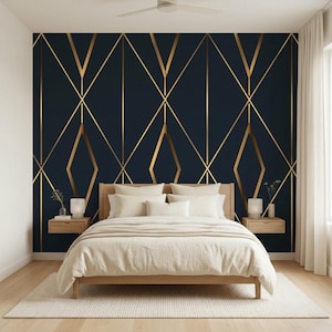 May include: A bedroom featuring a navy blue accent wall with a gold geometric pattern. A light wood bed frame is centered, dressed with white bedding. Two floating nightstands flank the bed, each with a lamp. A white rug and curtains complete the room.