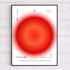 May include: A framed vertical poster featuring a large, vibrant red gradient circle centered on a white background. The text includes "ネオンの夢", Tokyo coordinates, "TOKYO 東京", "DISTRICTS OF TOYKO", and a small green circular emblem with Japanese characters.