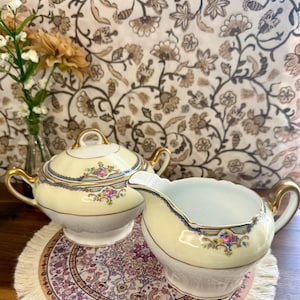 Antyczny zestaw do śmietanki i cukru Paul Müller Selb Bavaria Minto, zabytkowa niemiecka porcelana z kwiatowym złotym wykończeniem